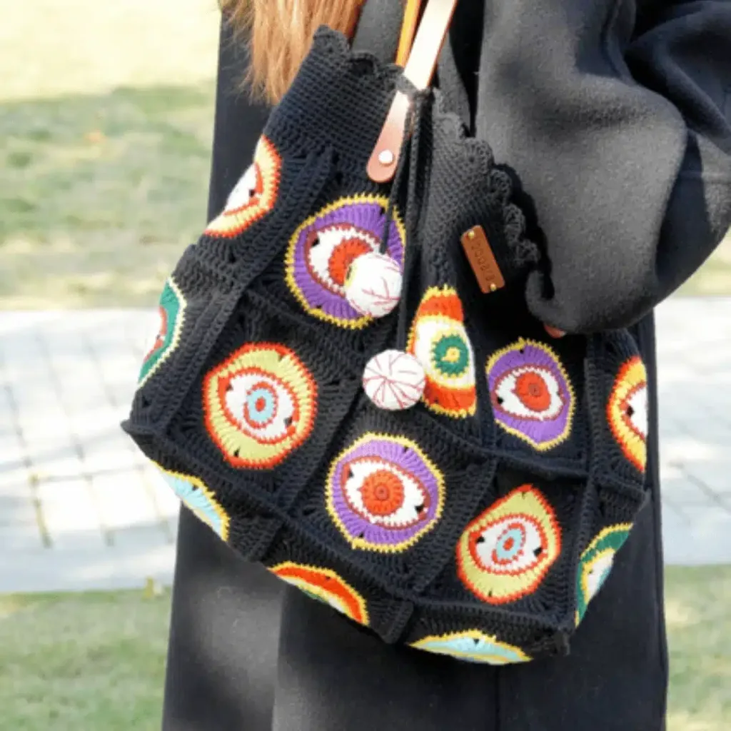 50+ Fabulous Free Bag Patterns 1 Black Granny Square Bag by Loopara