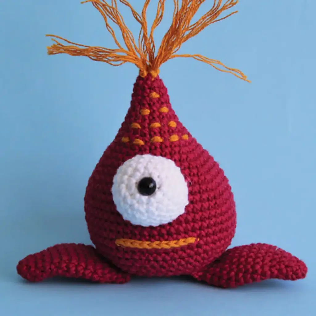 Crochet Monster pattern stitches a playful beast—perfect for grins!