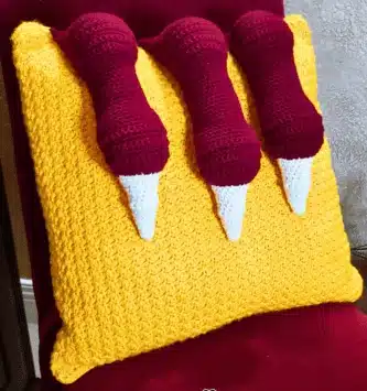 16 Best Free Crochet Dragon Patterns for Beginners & Experts 7 Dragon Claw Pillow