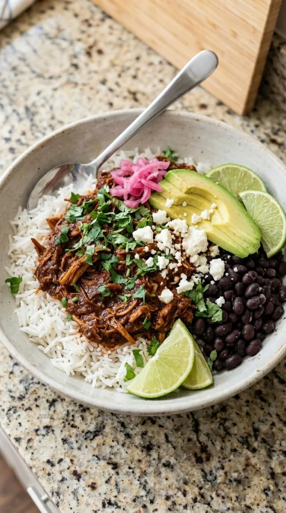 Chicken barbacoa bowl with rice and fresh toppings