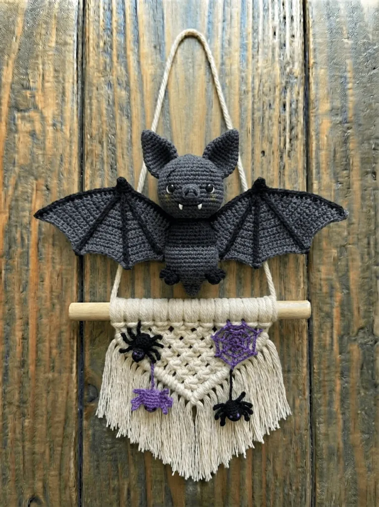 Crochet bat wall hanging handmade with dark yarn, spooky crochet fiber art wall decor