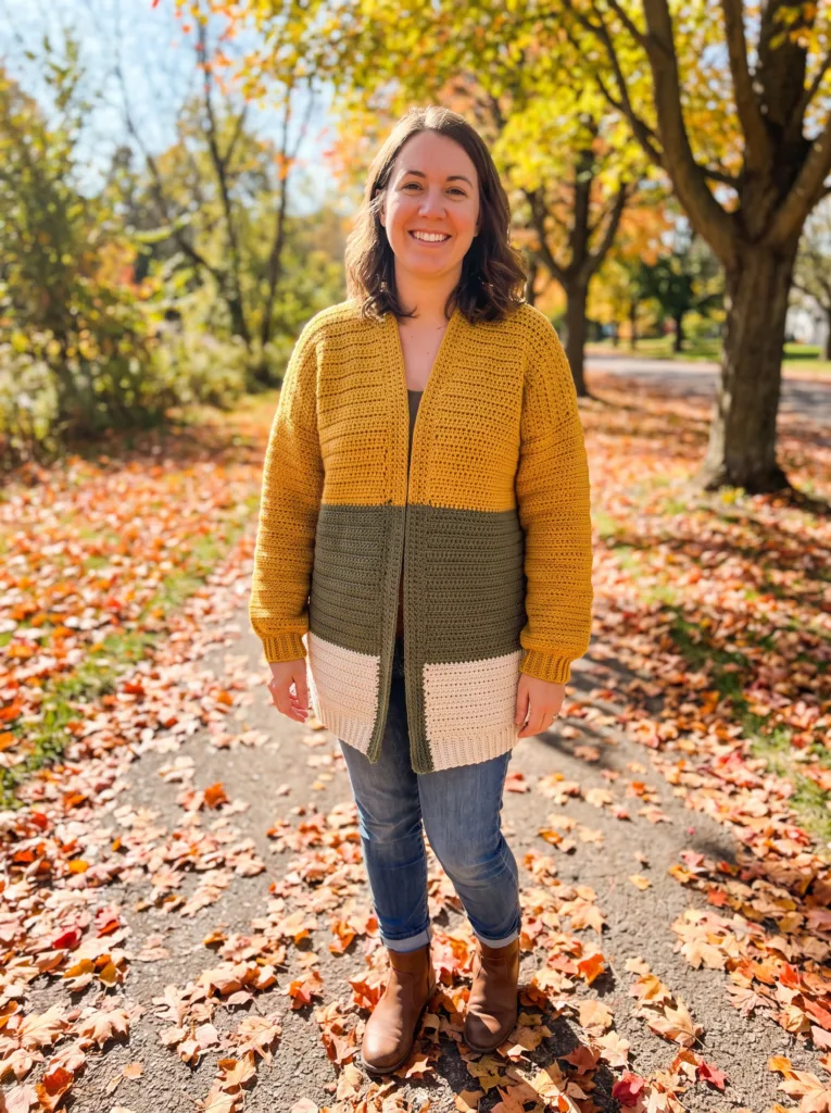 Crochet colorblock cardigan in mustard, olive, and cream horizontal sections