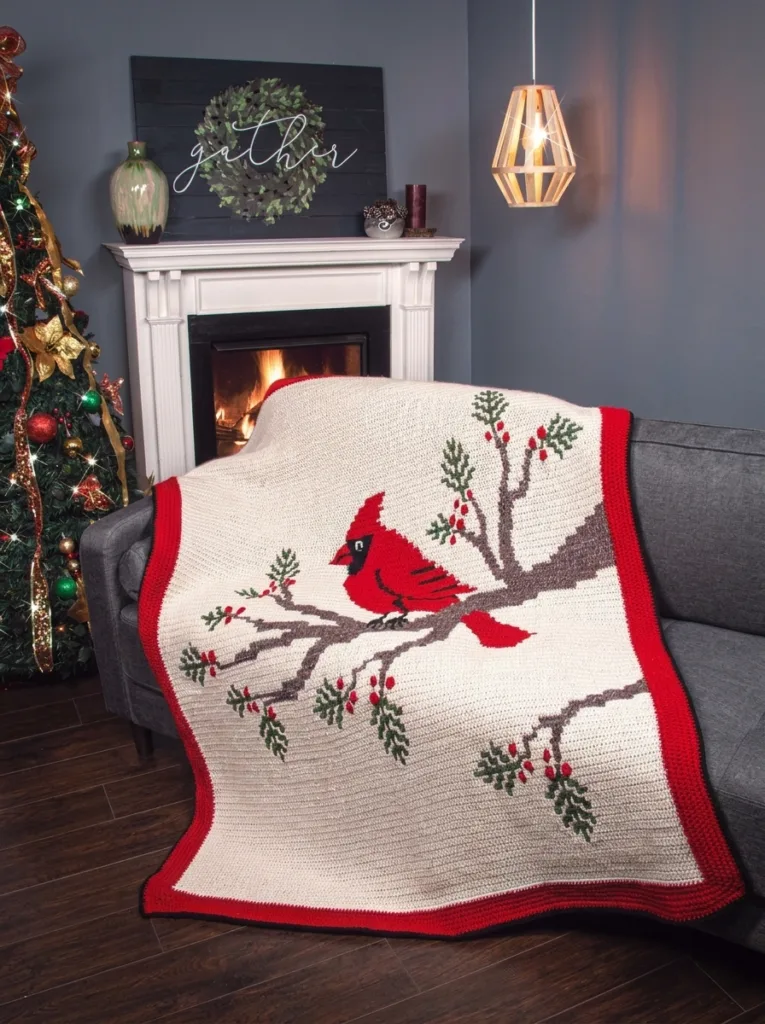 Crochet cardinal mosaic blanket with pine branches, Christmas pattern