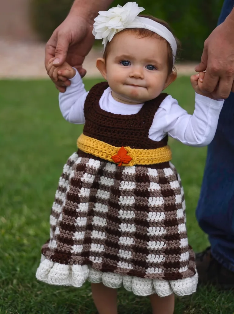 Crochet fall dress with leaf belt buckle, autumn baby pattern