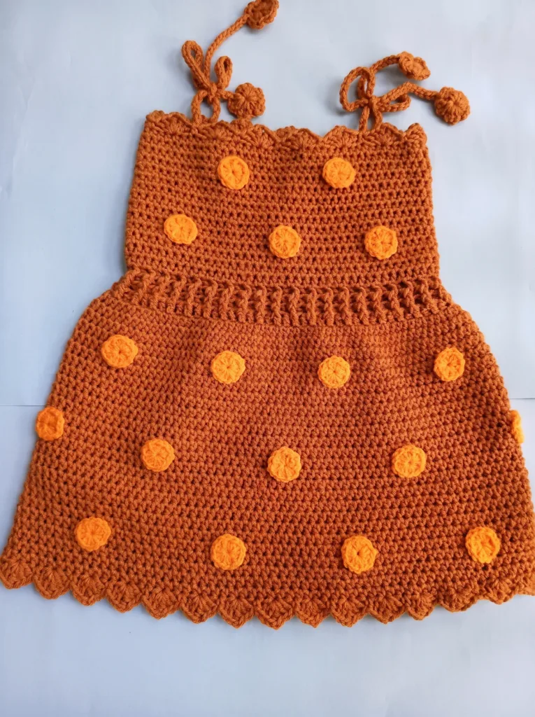 Crochet polka dot baby dress with bolero jacket, brown autumn pattern