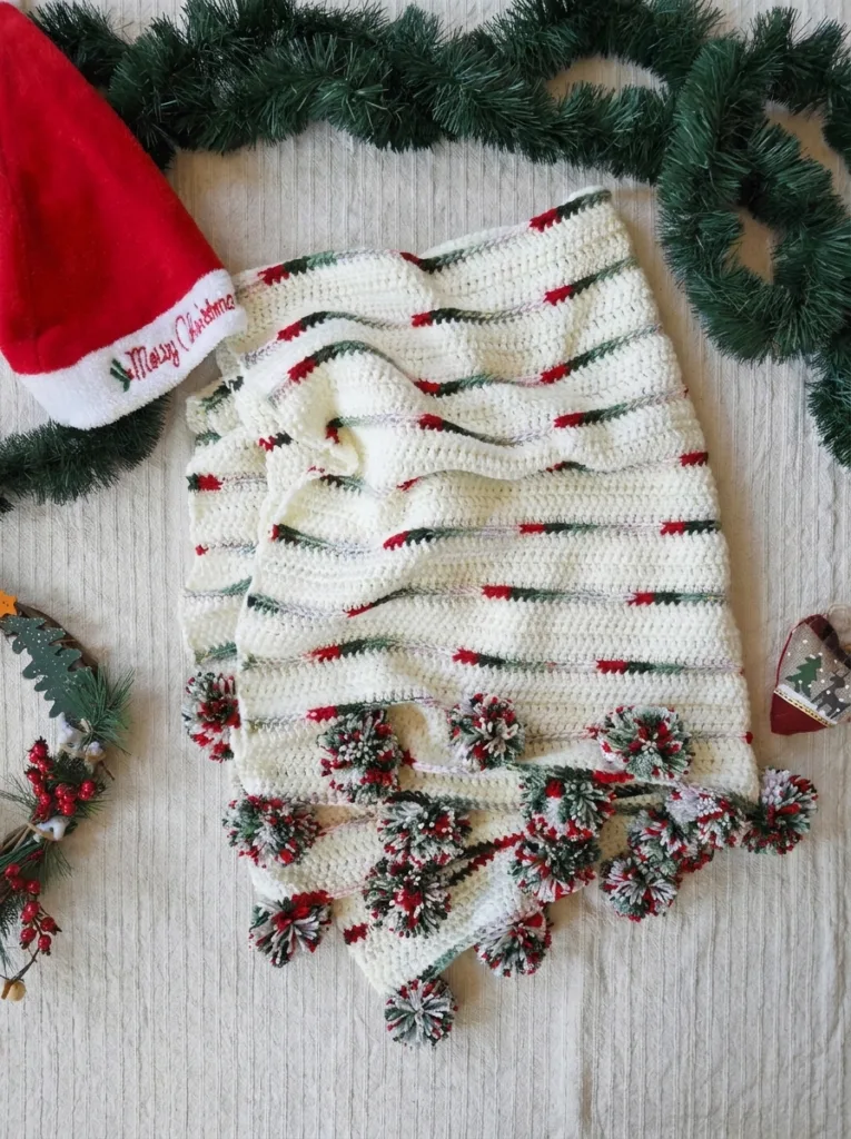 20 Free Crochet Christmas Blanket Patterns 12 Crochet white Christmas throw with pom-pom trim pattern